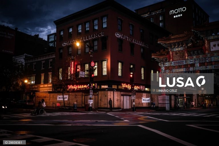A store is seen protected with wooden boards in Washington DC, United States, 01 November 2020 (issued on 02 November 2020). Downtown Washington DC meets commercial establishments protected by plywood boards for fear of "disturbances" after the release of the presidential election results and signs of protest from the "Black Lives Matter" movement near the White House railings where a demonstration is being prepared for election night. MARIO CRUZ/LUSA