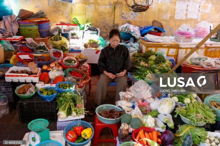 Vietname: Mercado de rua em Hanoi