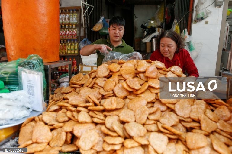 Vietname: Mercado de rua em Hanoi