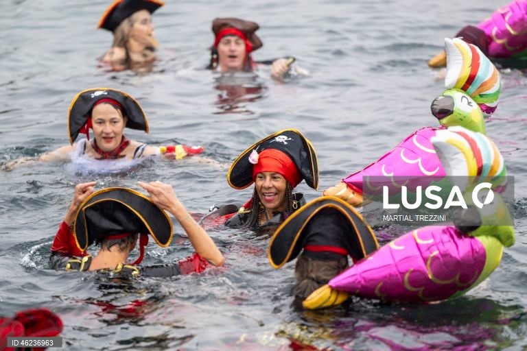 Suiça: Tradicional banho de Natal no Lago Genebra