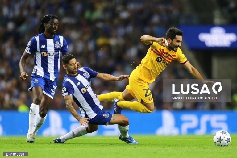 FC Porto’s João Mário (C) in action against FC Barcelona’s Gundogan (R) during the UEFA Champions League Group H soccer match, at Dragao stadium, Porto, Portugal, 4th October 2023, MANUEL FERNANDO ARAUJO/LUSA