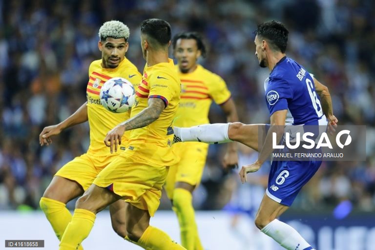 FC Barcelona's Joao Cancelo (L) in action against FC Porto’s Eustaquio (R) during the UEFA Champions League Group H soccer match, at Dragao stadium, Porto, Portugal, 4th October 2023, MANUEL FERNANDO ARAUJO/LUSA