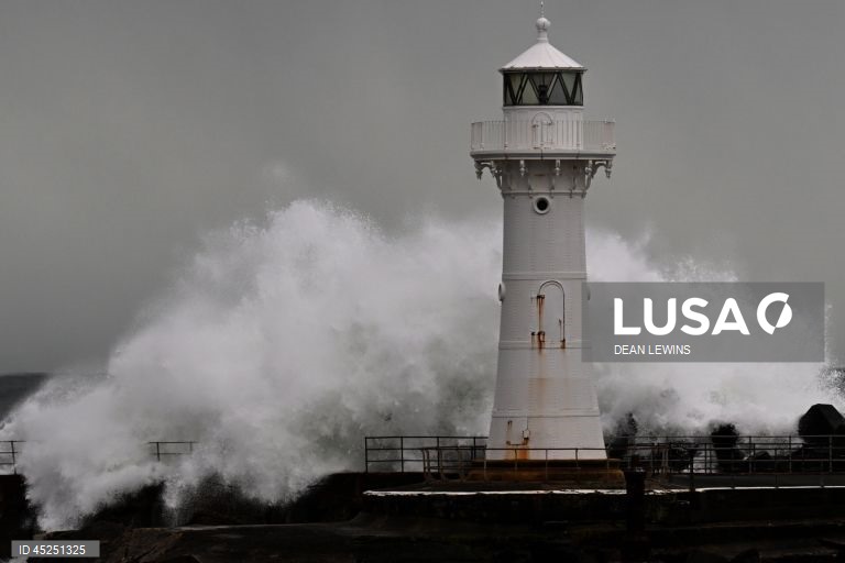 Heavy swells and torrential rain hit New South Wales coast
