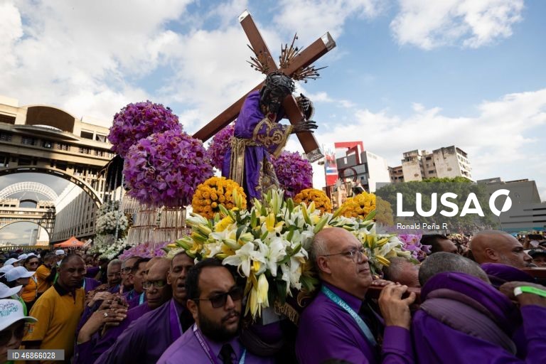 Faithful accompany the procession of the Nazarene of San Pablo through the streets of Caracas